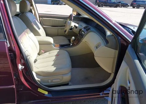 2003 Toyota Avalon Xls z USA, uszkodzony, nr VIN 4T1BF28B03U287972